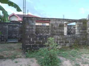 Unfinished church walls awaiting funds