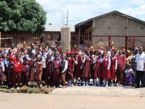 Students at the new gate to their campus