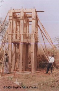 Medical director Dr. T.O. Ojebode (at right) and administrative director Mr. M.A. Olomitutu inspected the construction of the tower while it was under construction